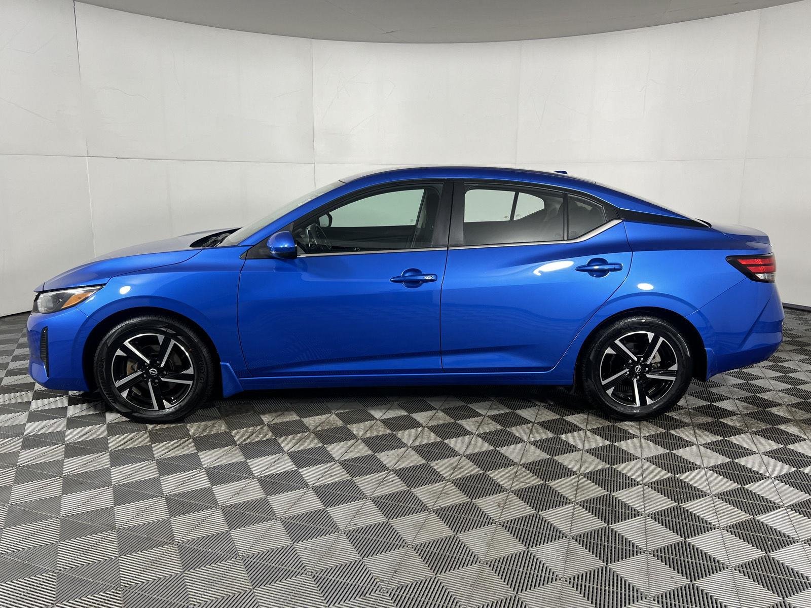 Used 2024 Electric Blue Metallic Nissan SV image 4