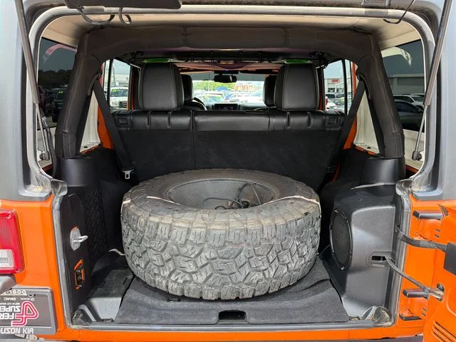 Used 2013 Orange Jeep Unlimited Rubicon image 24
