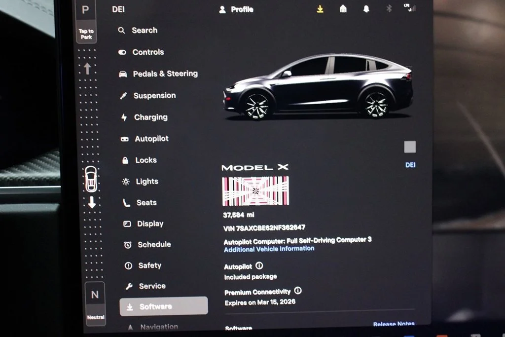 Used 2022 Solid Black Tesla Plaid image 24