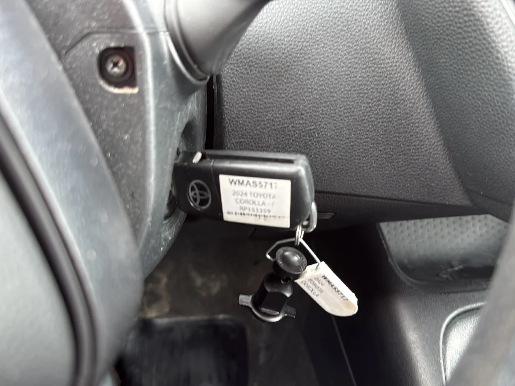 Used 2024 Black Toyota LE image 13