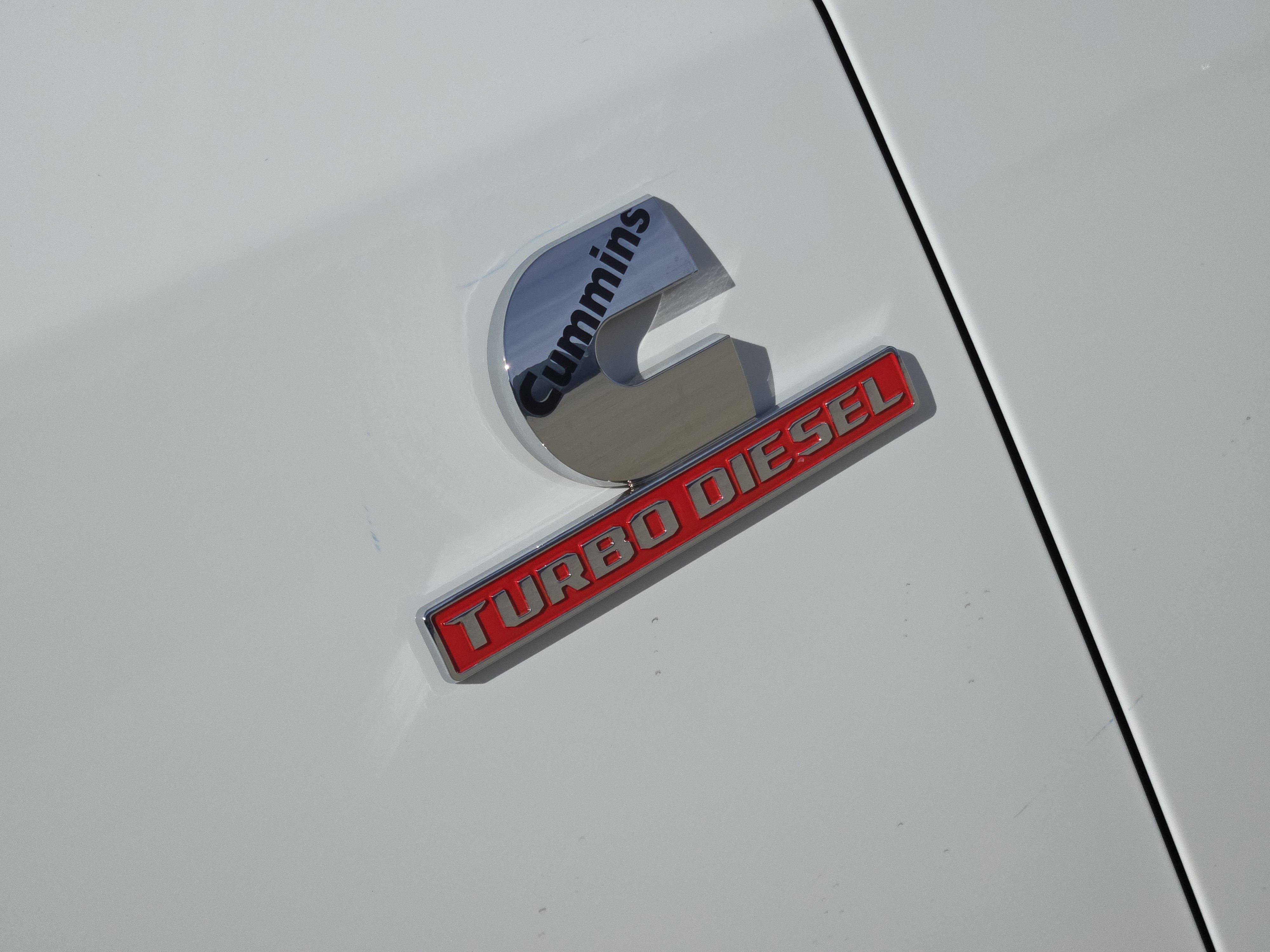 New 2026 Bright White Clear-Coat Exterior Paint RAM Laramie image 9