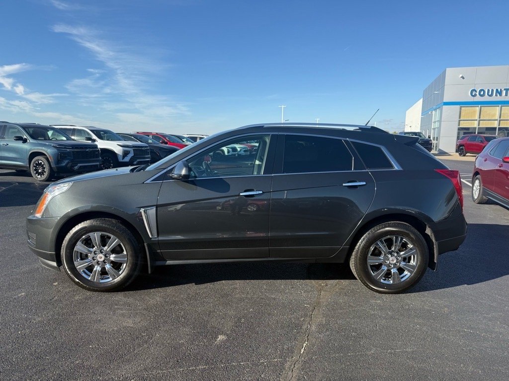 Used 2014 Cadillac SRX Luxury Collection with VIN 3GYFNEE30ES608395 for sale in Herscher, IL