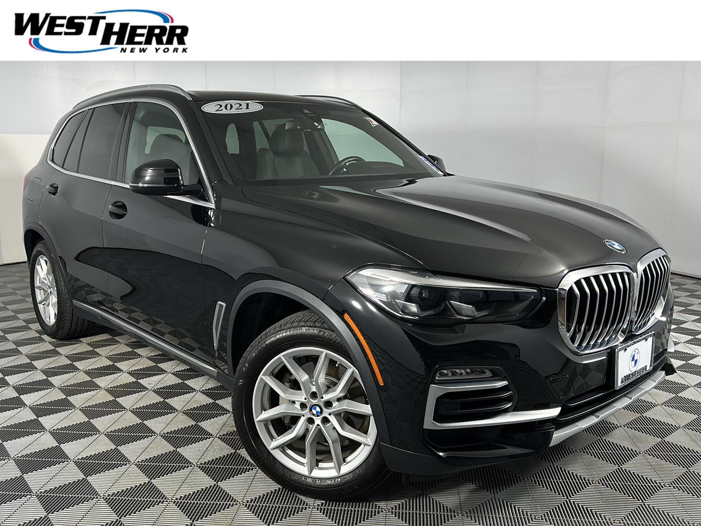 Used 2021 Jet Black BMW xDrive40i image 1