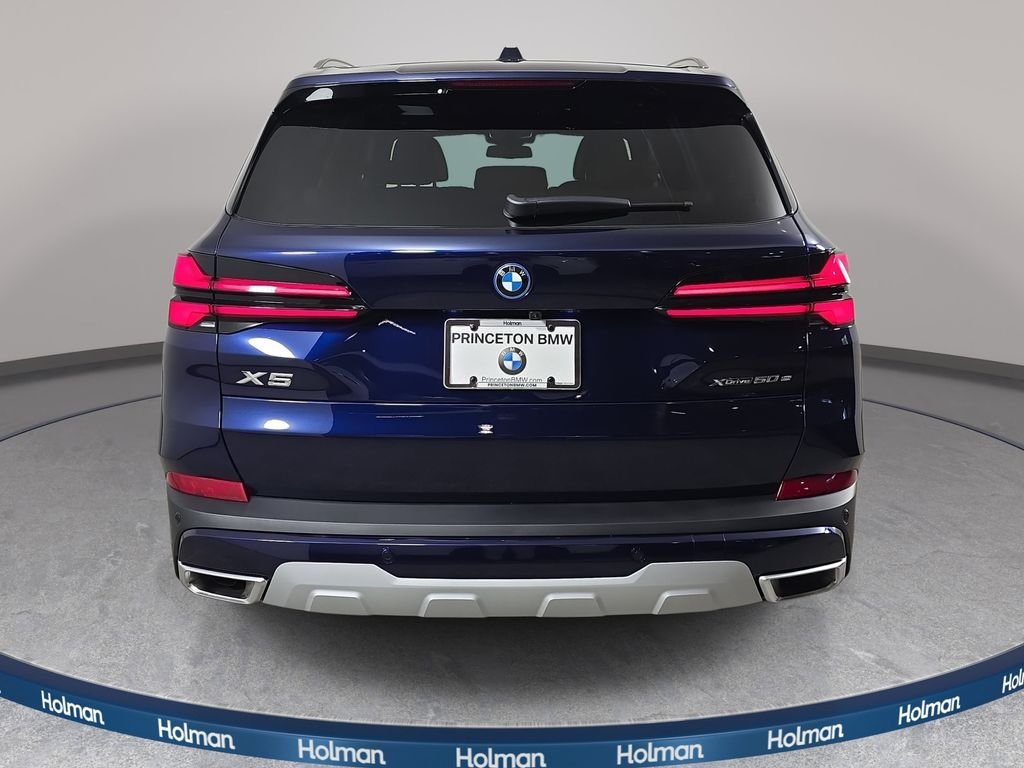 New 2026 Tanzanite Blue II Metallic BMW xDrive50e image 6