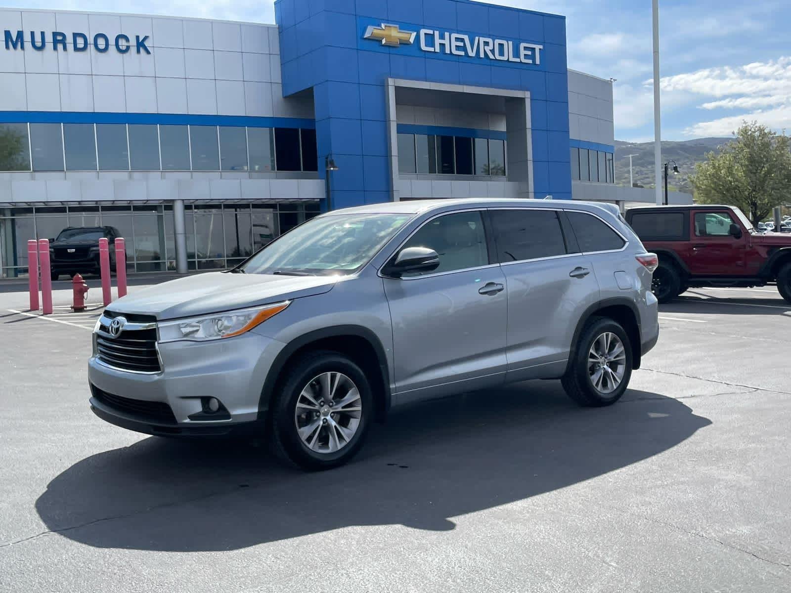 Used 2015 Toyota Highlander LE Plus with VIN 5TDBKRFH3FS104380 for sale in Woods Cross, UT