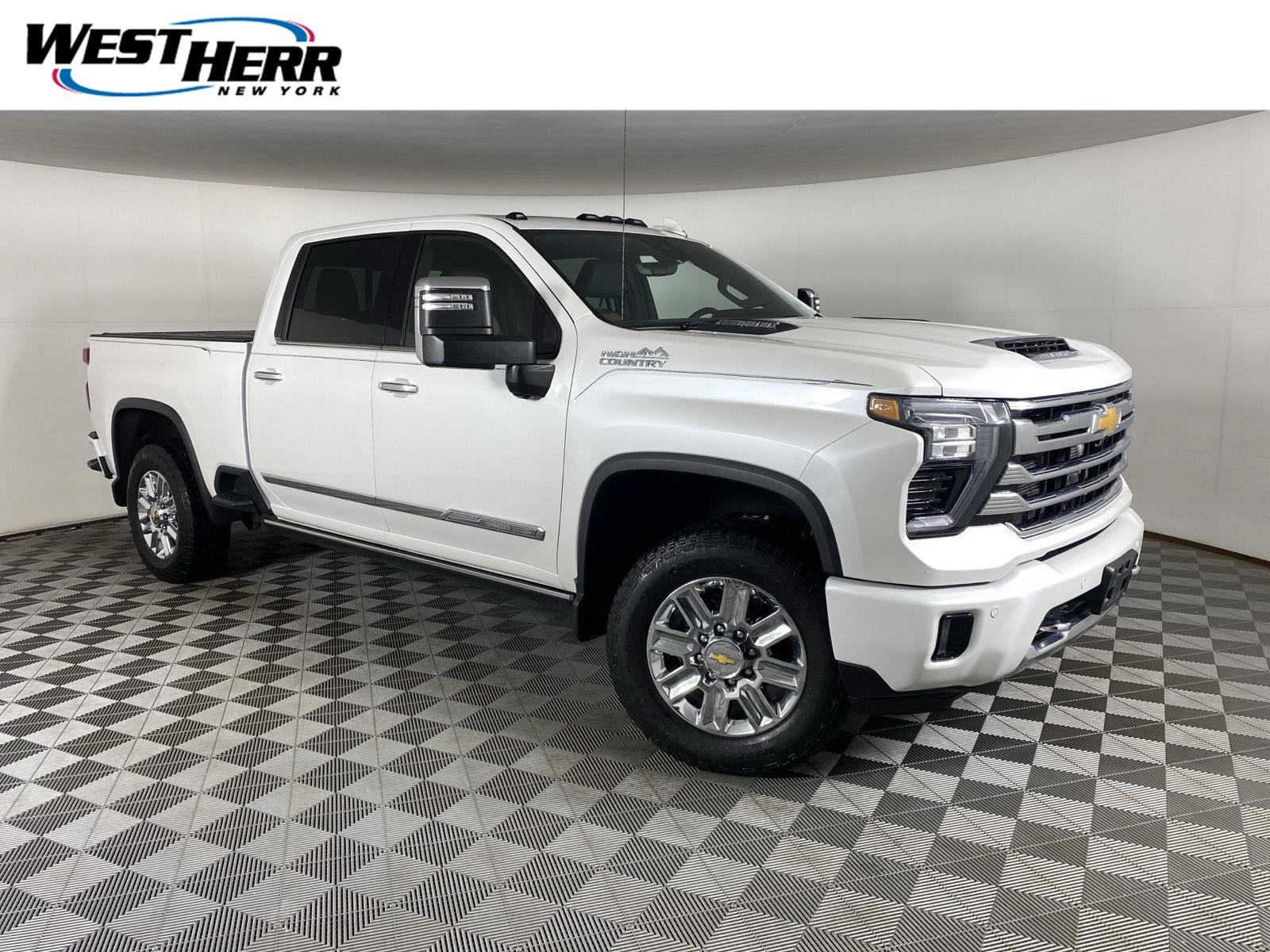 Used 2024 Iridescent Pearl Tricoat Chevrolet High Country image 1