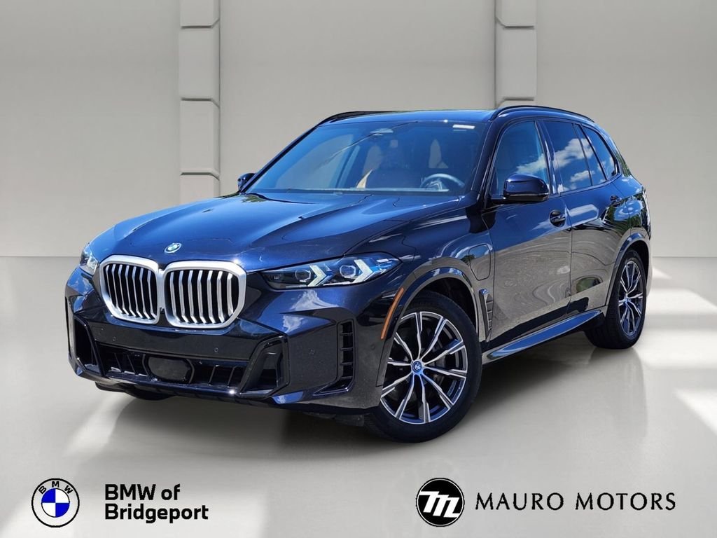 Used 2025 Black BMW xDrive50e image 1