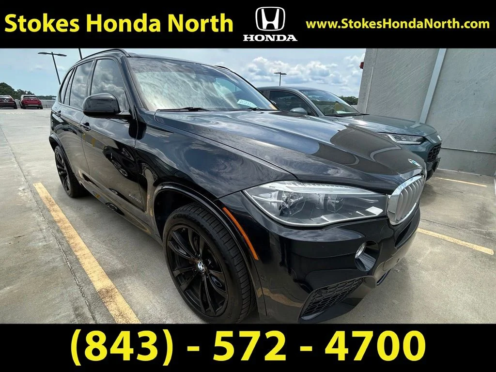 Used 2018 Black BMW xDrive50i image 1