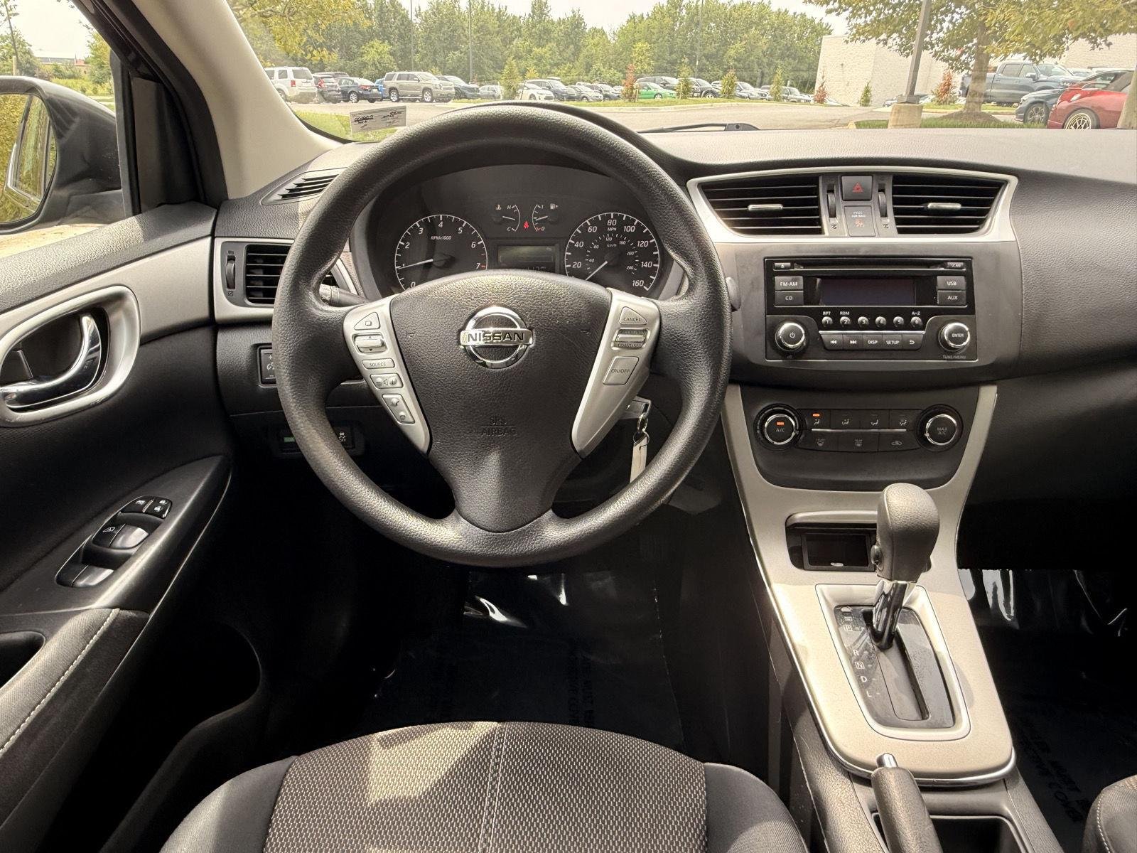 Used 2015 Super Black Nissan S image 19