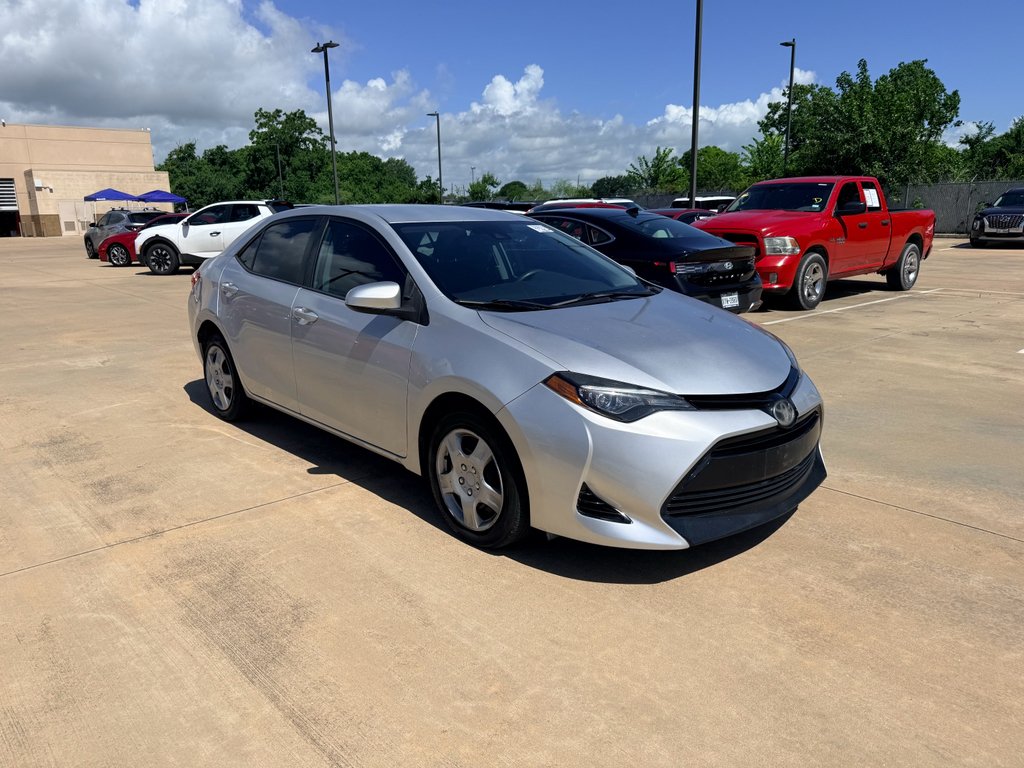 Used 2018 Classic Silver Metallic Toyota LE image 3
