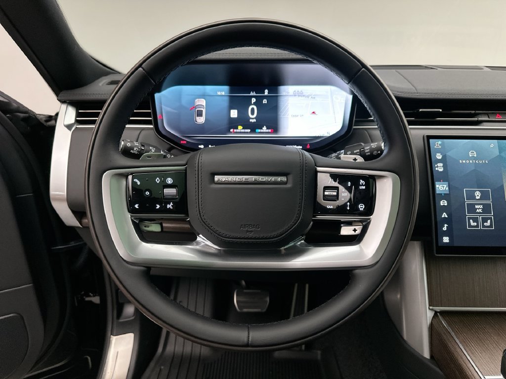 New 2027 Santorini Black Metallic Land Rover SE image 14