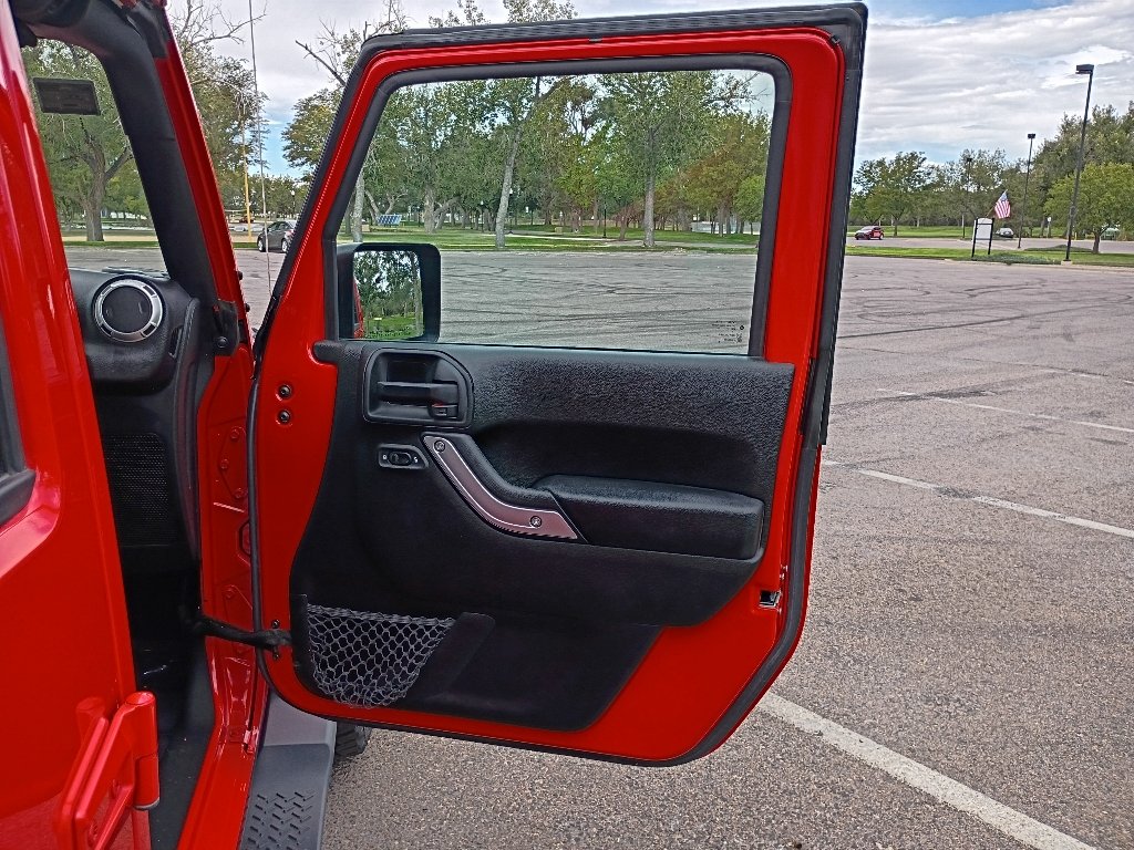 Used 2017 Firecracker Red Clearcoat Jeep Sahara image 9