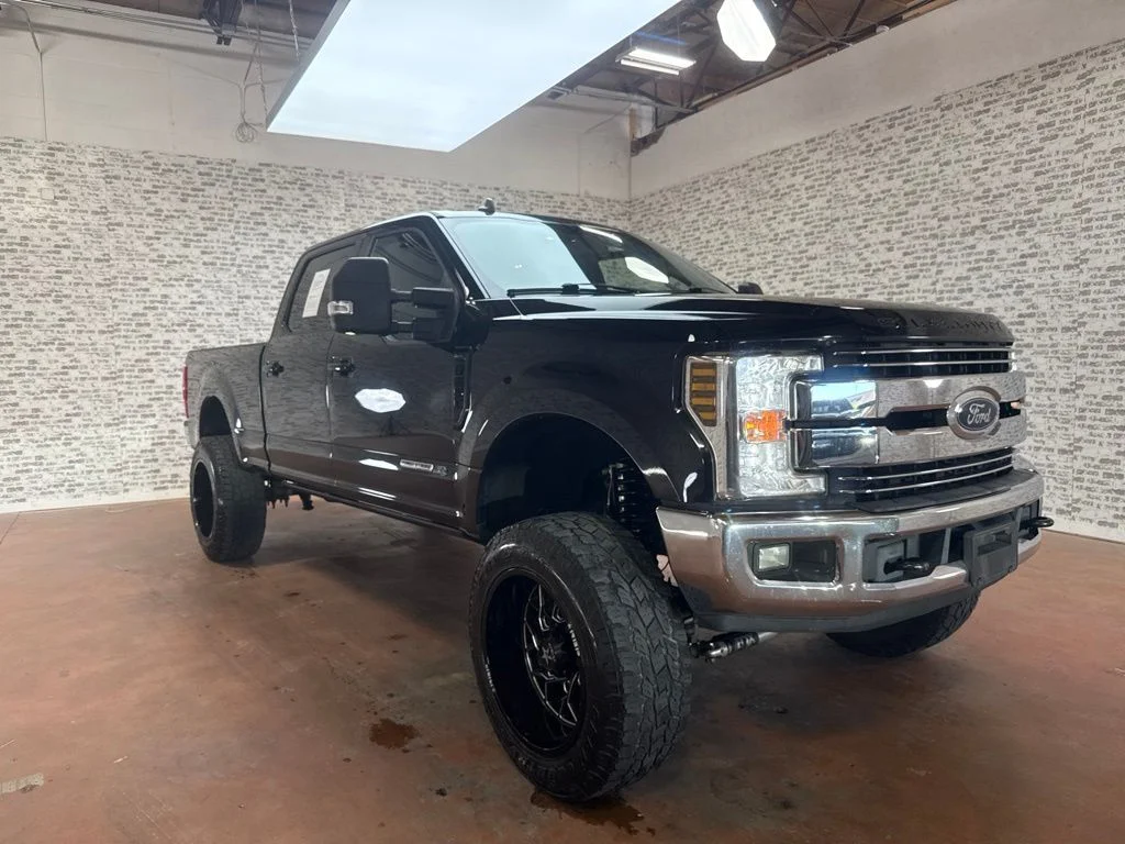 Used 2019 Agate Black Metallic Ford Lariat image 1