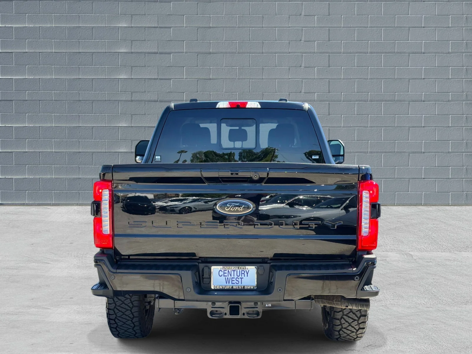 Used 2026 Agate Black Metallic Ford LARIAT 4WD Crew Cab 6.75