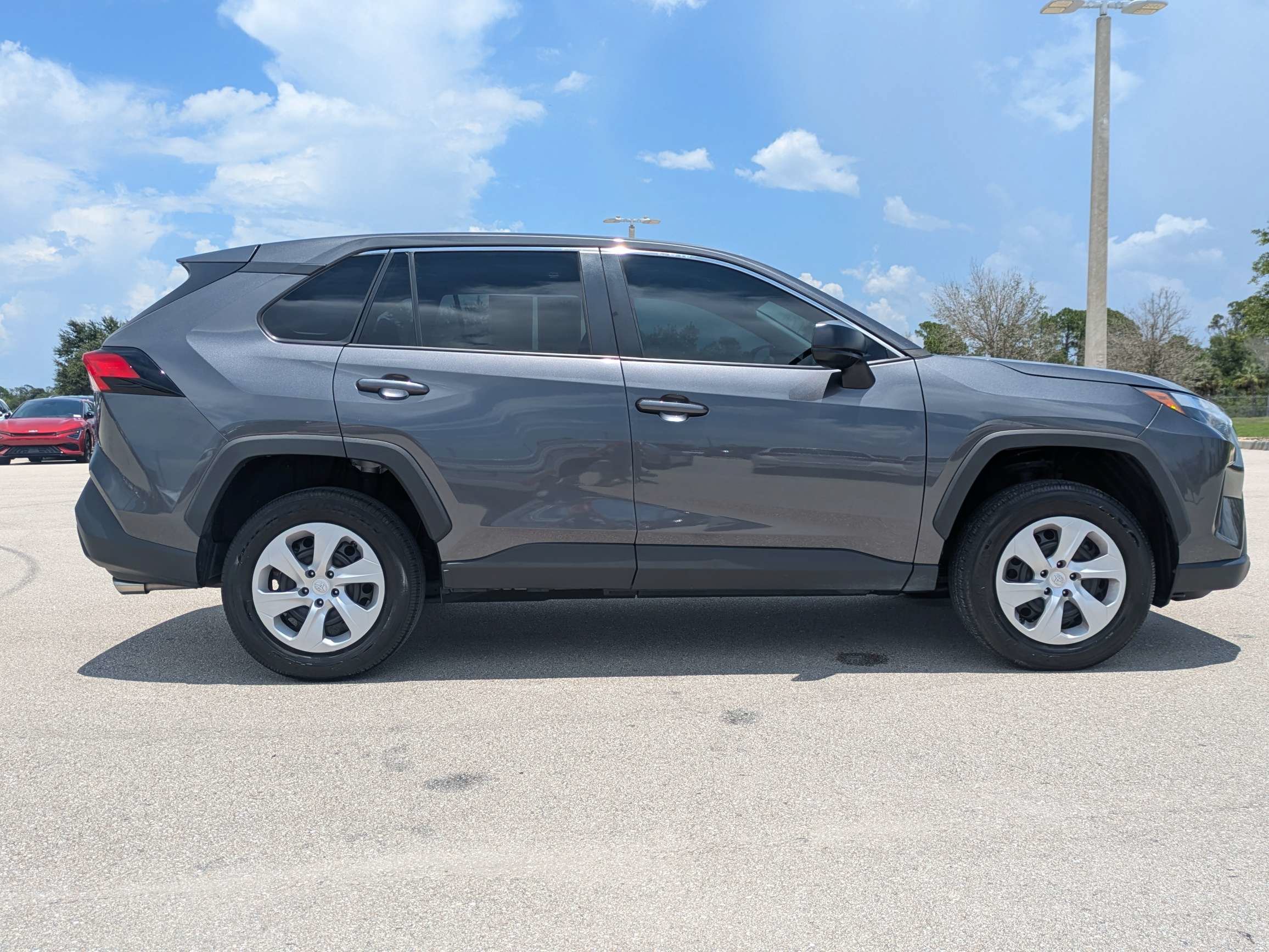 Used 2024 Magnetic Gray Metallic Toyota LE image 3