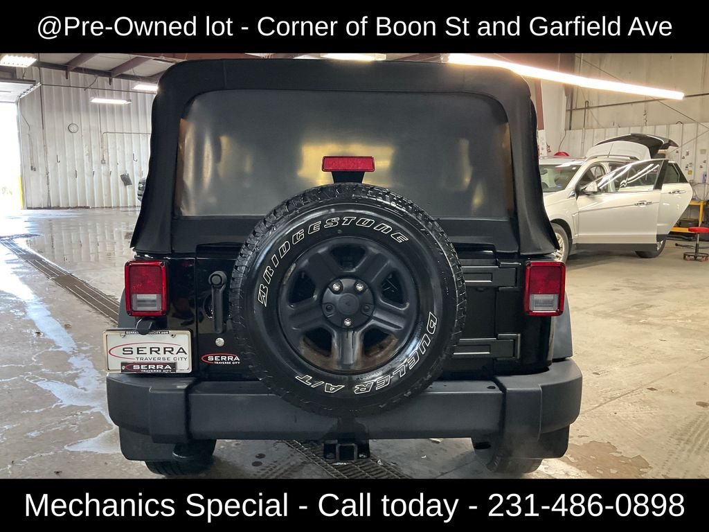 Used 2015 Black Jeep Unlimited Sport image 4