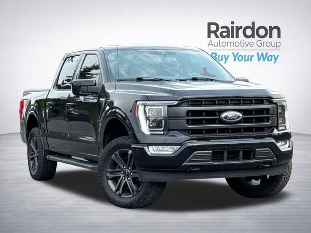 Used 2021 Agate Black Metallic Ford Lariat image 1