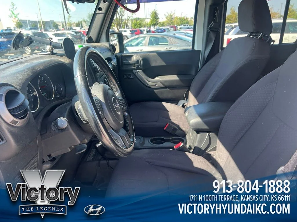 Used 2013 White Jeep Unlimited Sport image 10