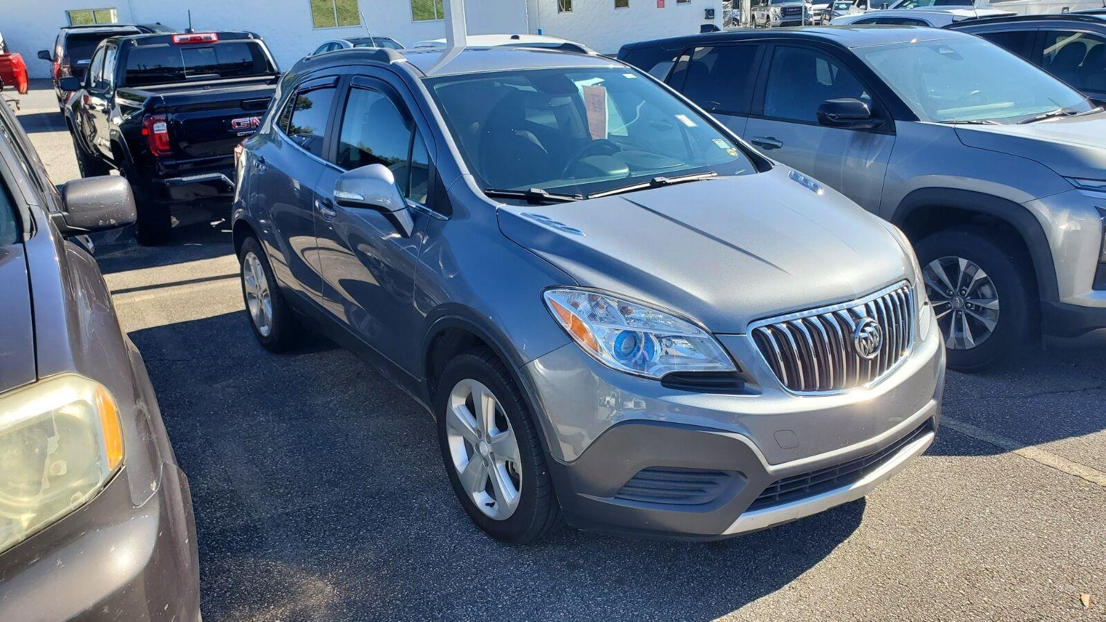 Used 2015 (Built out for 2015 model year. Includes (BT3) Dark Argent Metallic lower accent color.) Buick AWD 4dr image 2
