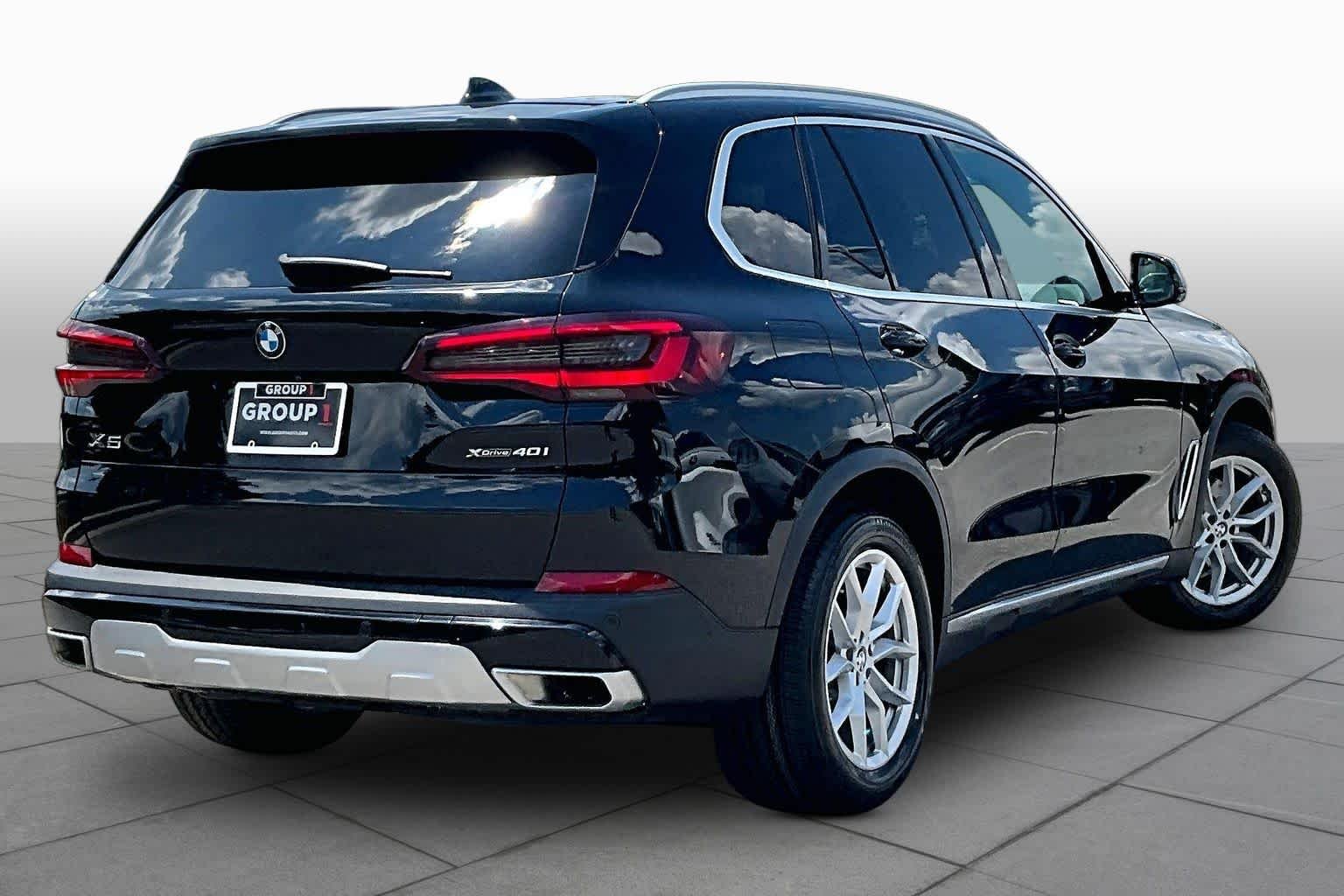 Certified Used 2023 Jet Black BMW xDrive40i image 12