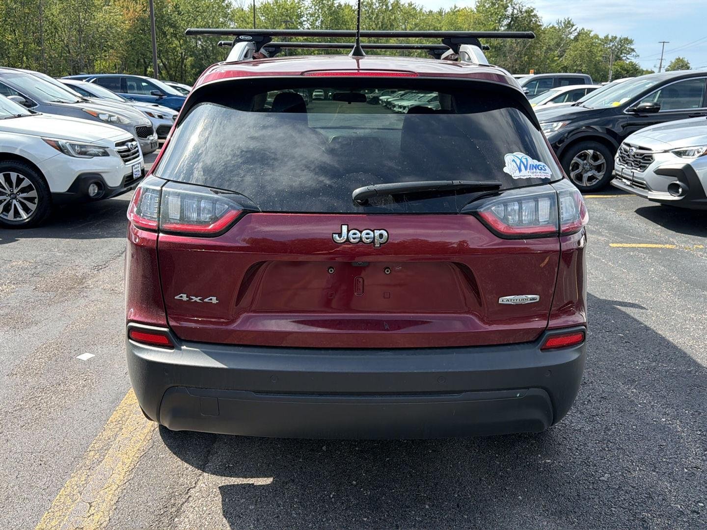Used 2020 Velvet Red Pearlcoat Jeep Latitude Plus image 6