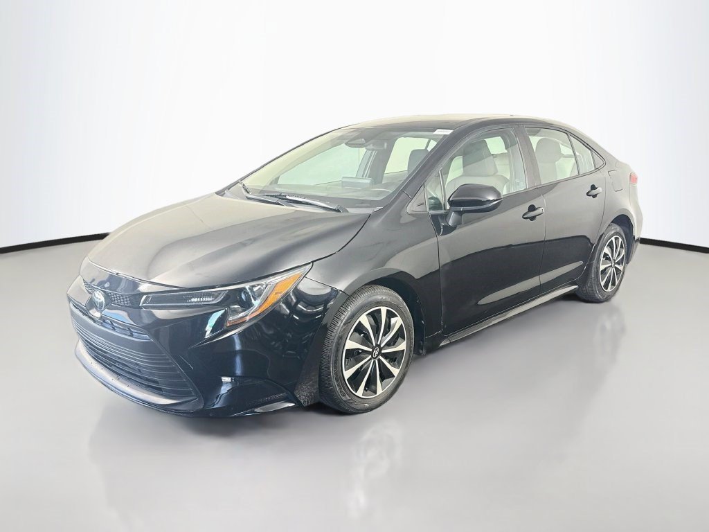 Used 2023 Midnight Black Metallic Toyota LE image 3