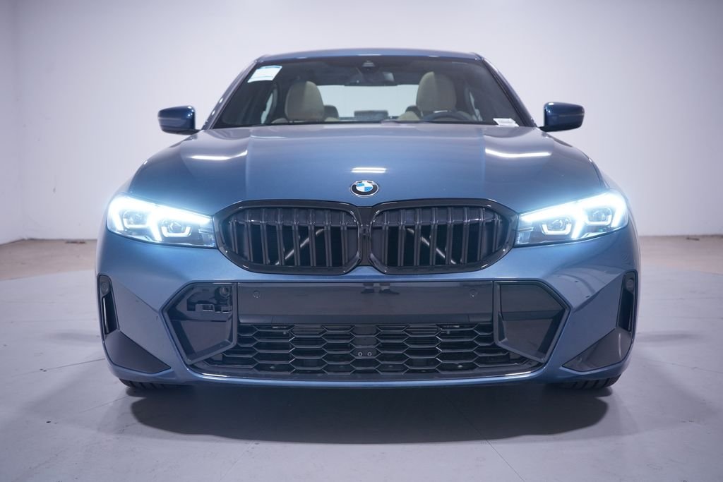 New 2026 Blue Metallic BMW 330i image 4