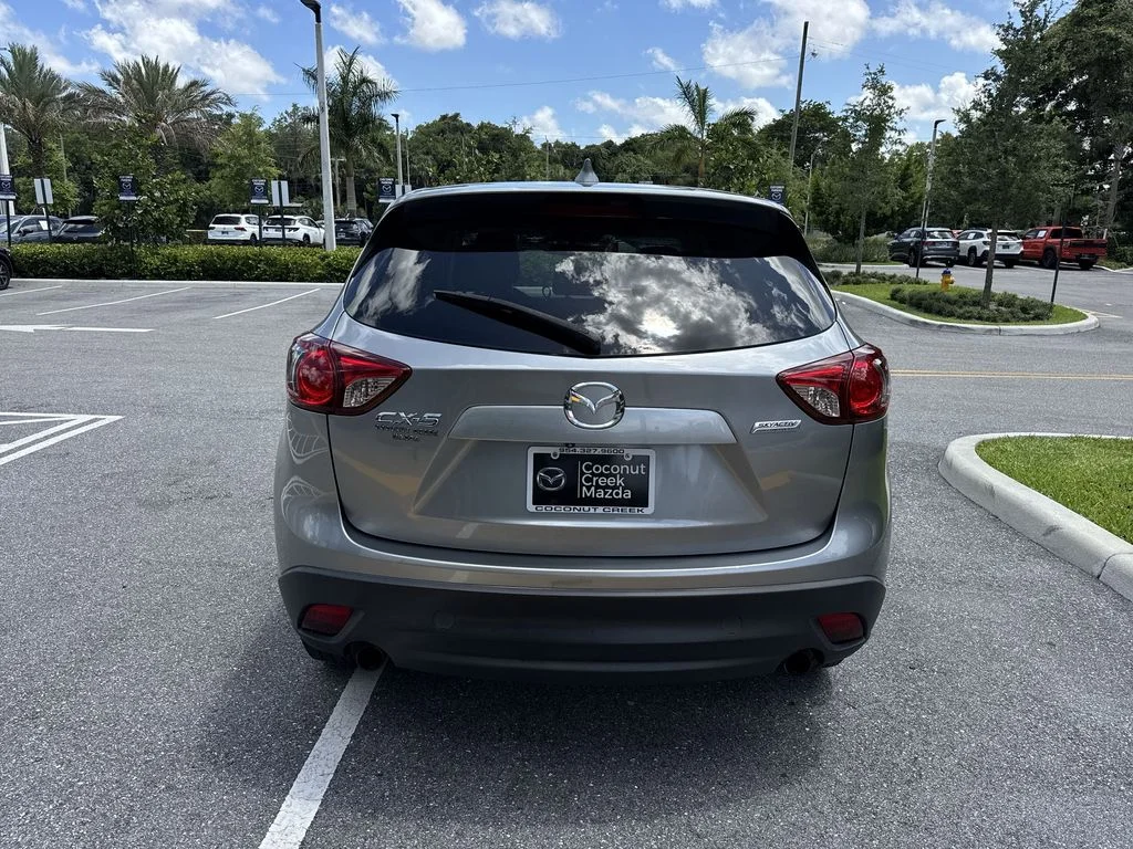 Used 2015 Mazda CX-5 Touring with VIN JM3KE2CY5F0438889 for sale in Coconut Creek, FL