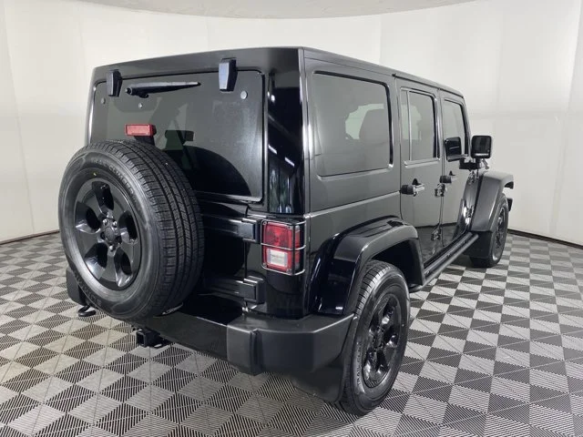 Used 2015 Black Jeep Unlimited Sahara image 6