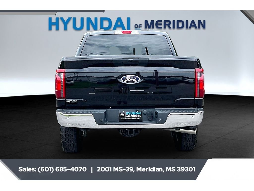 Used 2025 Agate Black Metallic Ford XLT image 4