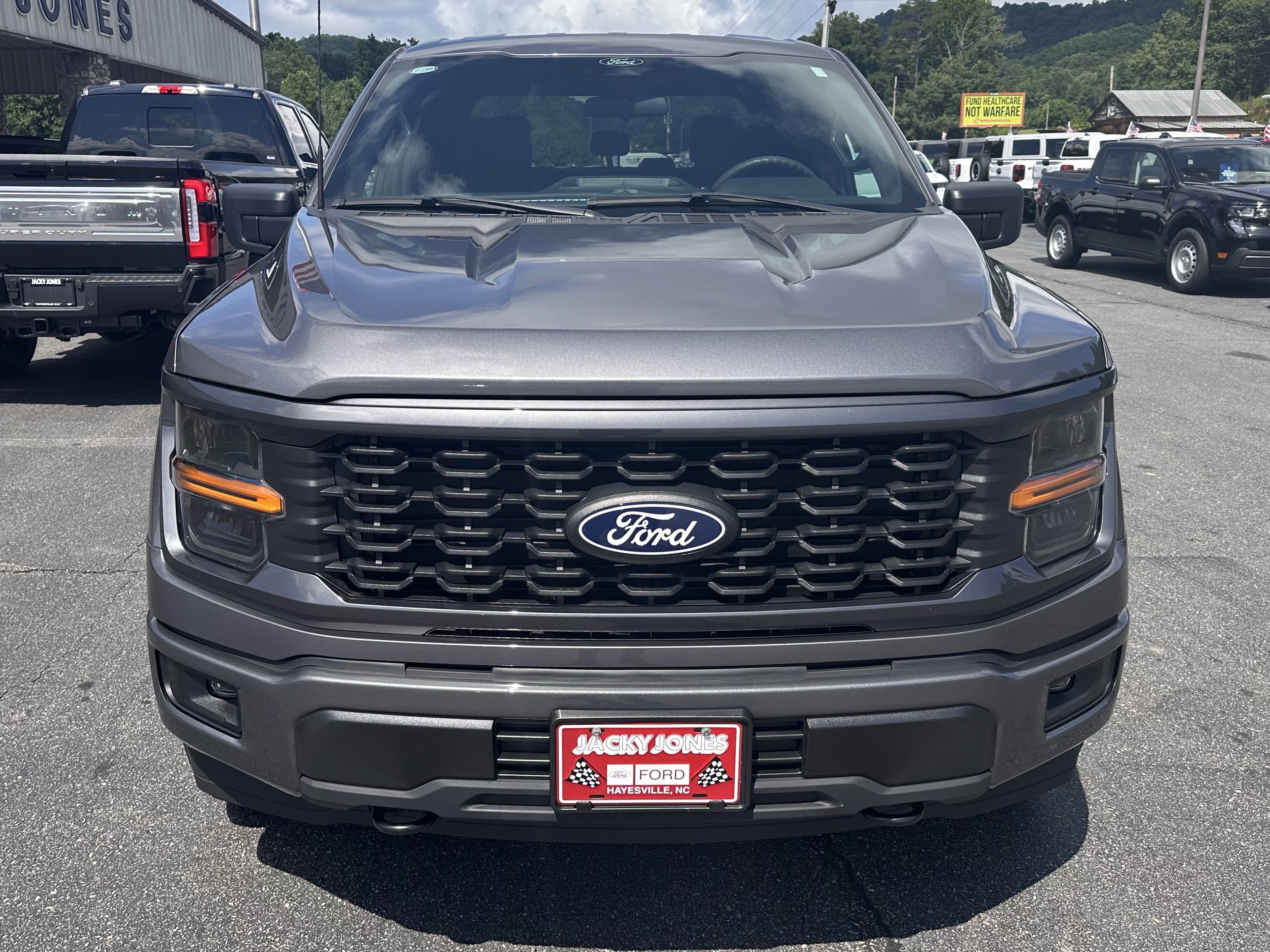 Certified Used 2024 Light Blue Clearcoat Metallic Ford STX image 3