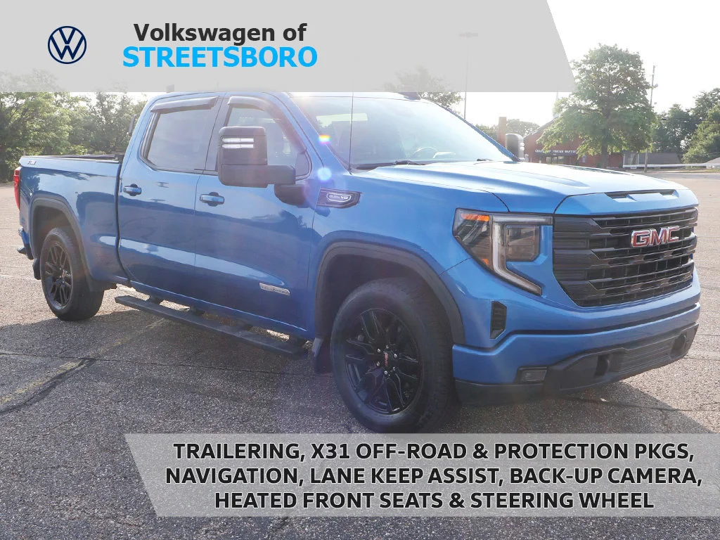 Used 2023 Dynamic Blue Metallic GMC Elevation image 1