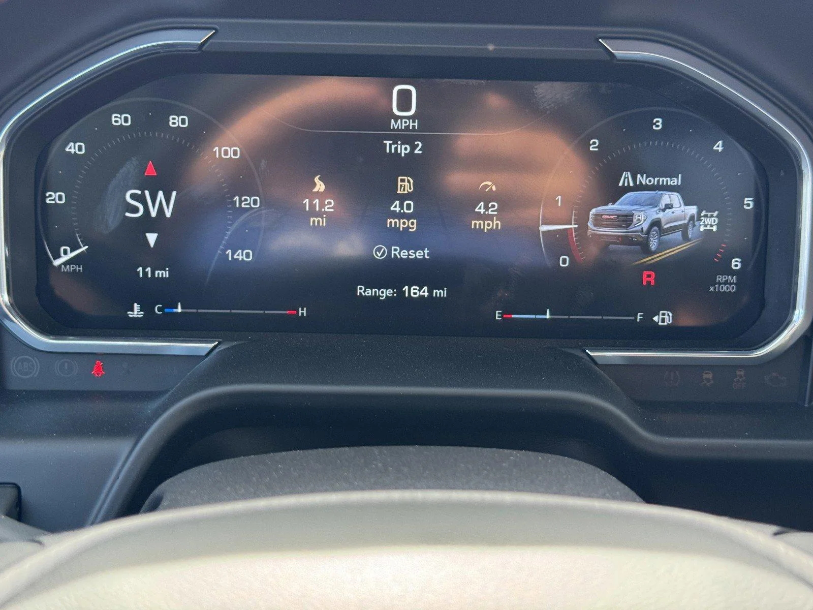 New 2026 TITANIUM RUSH METALLIC GMC AT4X image 22