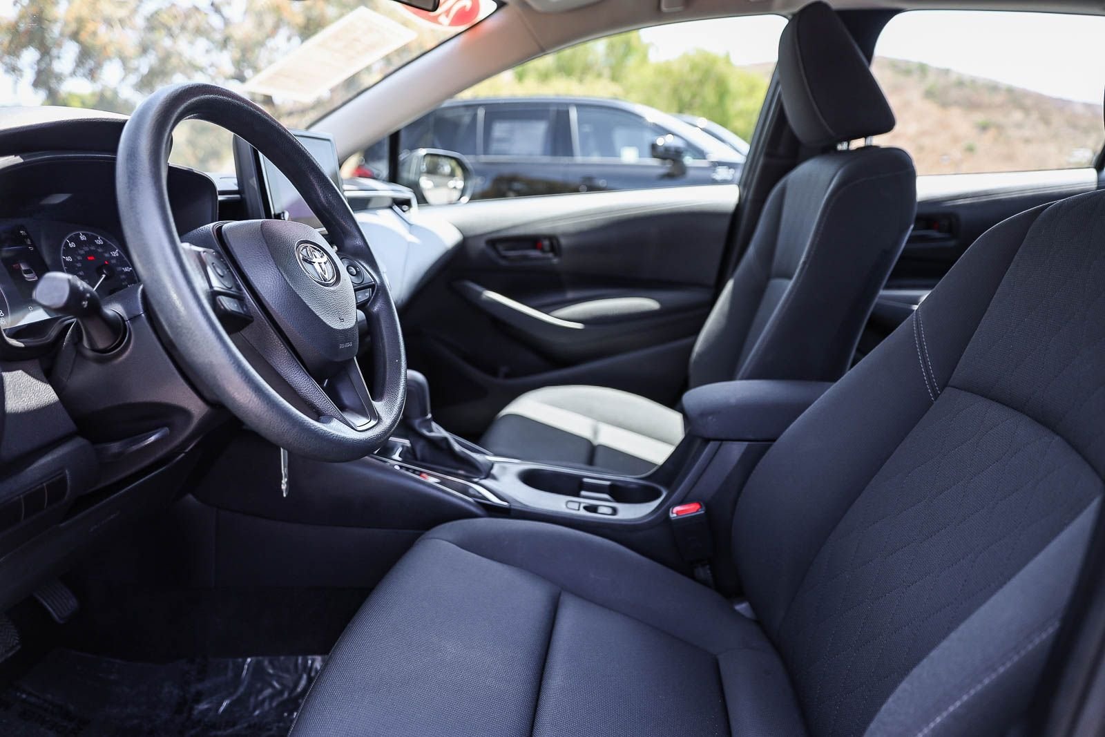 Certified Used 2024 MIDNIGHT BLACK METAL Toyota LE image 18