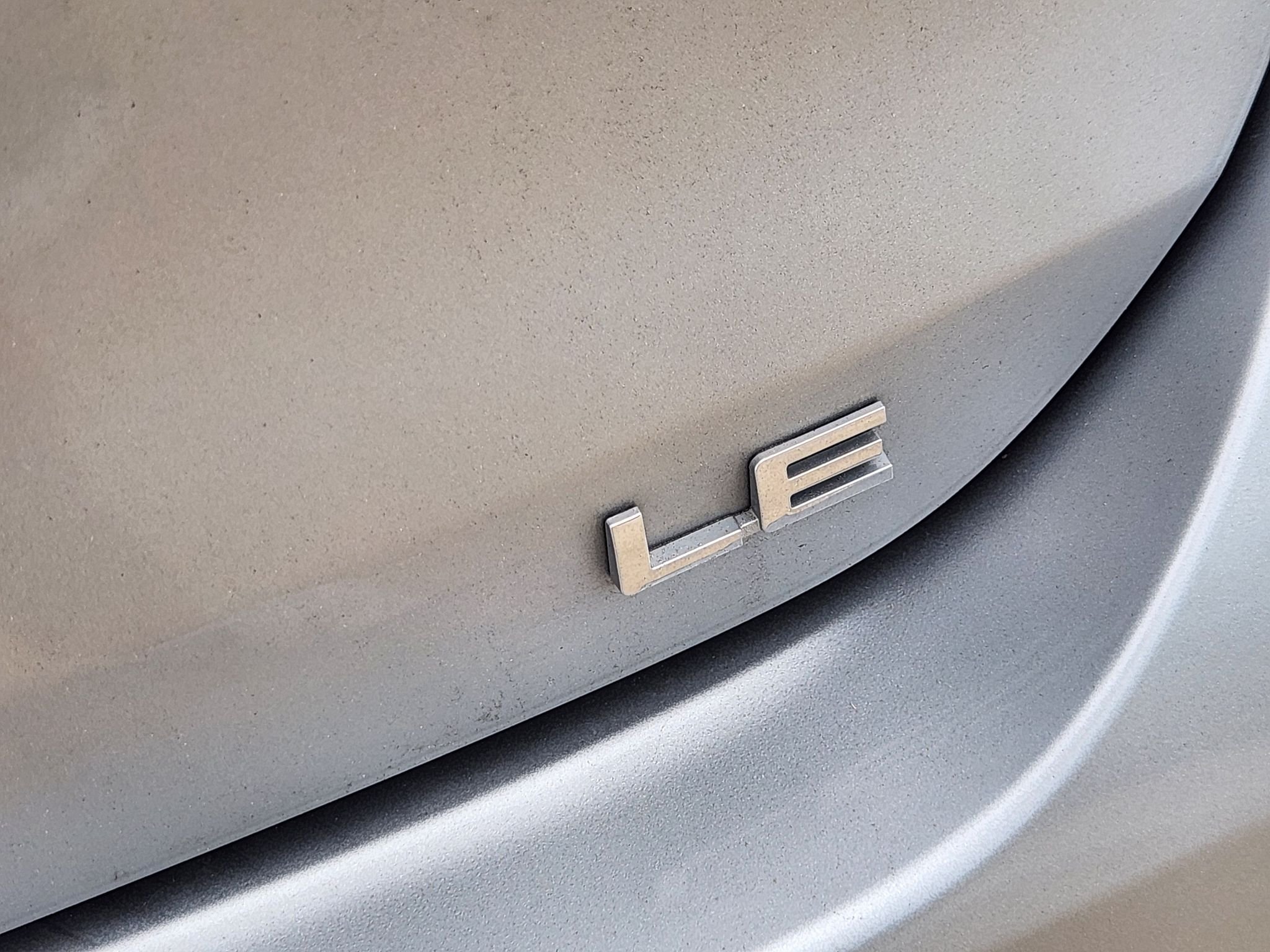 Used 2021 Celestial Silver Metallic Toyota LE image 11