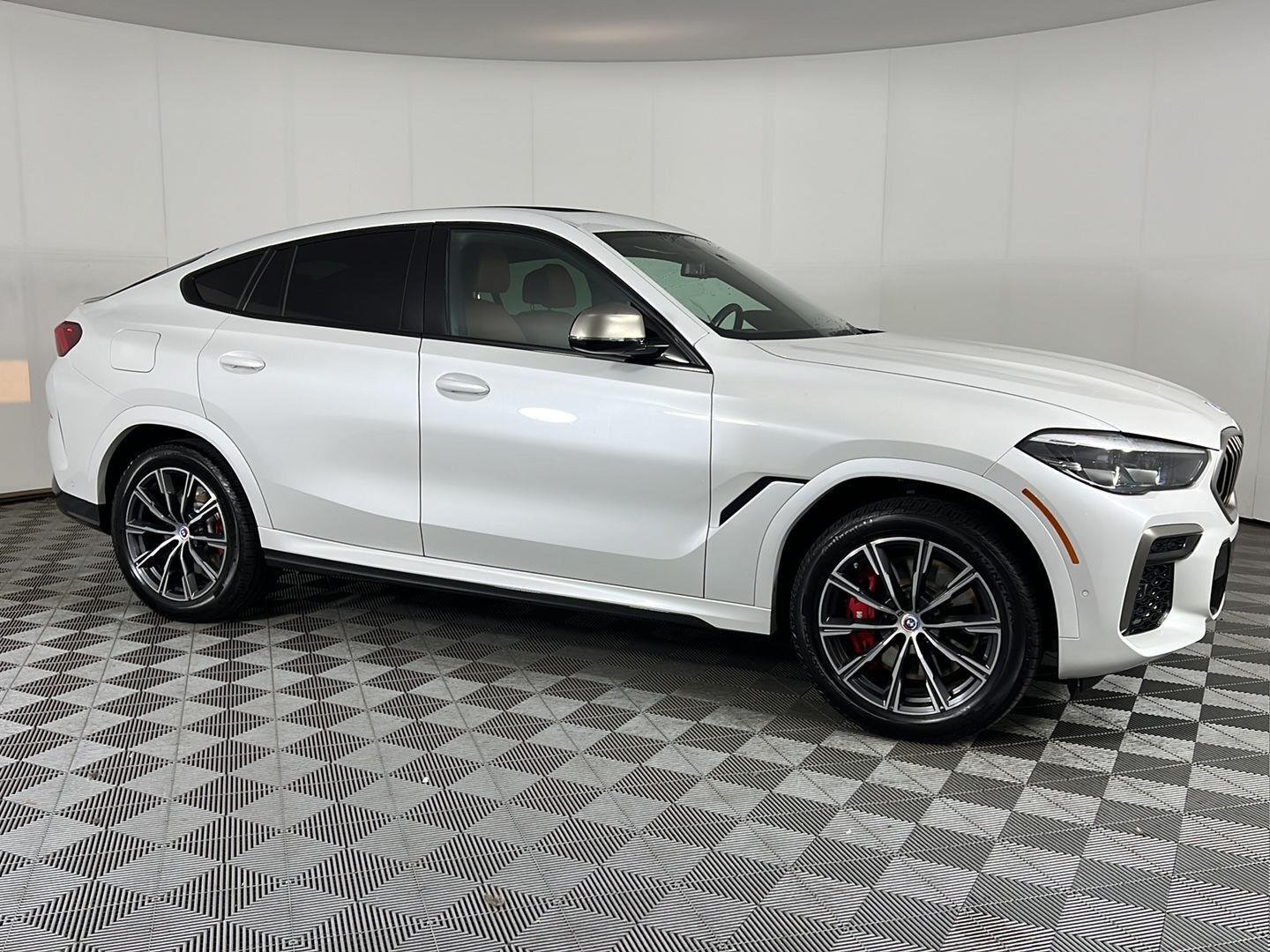 Certified Used 2023 Mineral White Metallic BMW M50i image 3