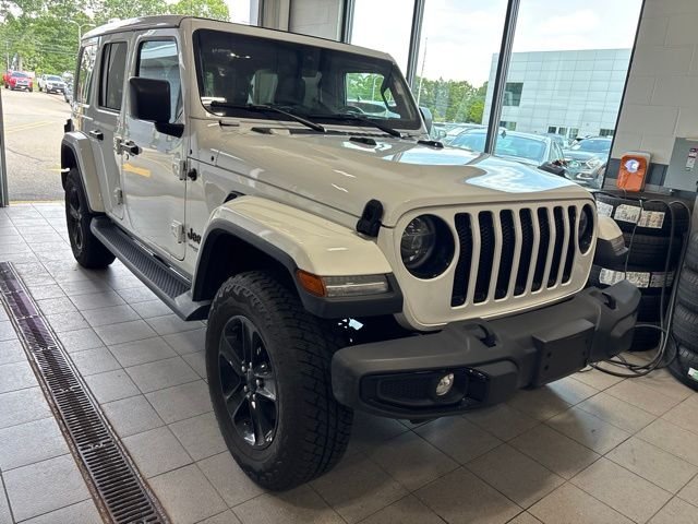 Used 2022 White Jeep Unlimited Sahara Altitude image 1
