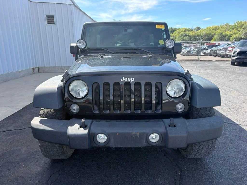 Used 2014 Black Clearcoat Jeep Unlimited Sport image 2