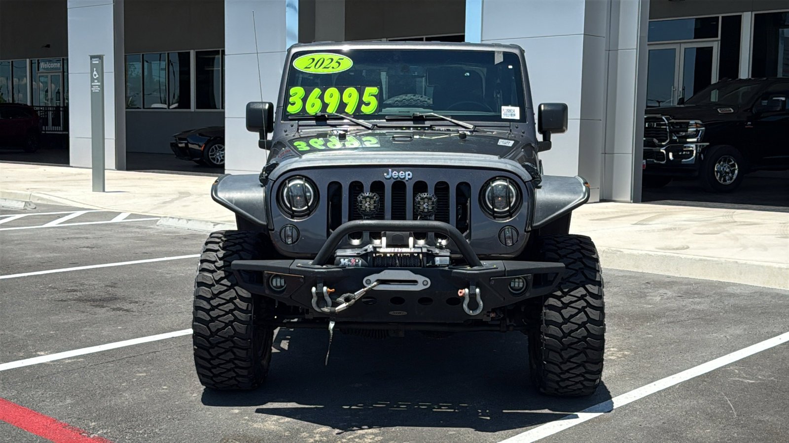 Used 2014 Granite Crystal Metallic Clearcoat Jeep Sport image 8