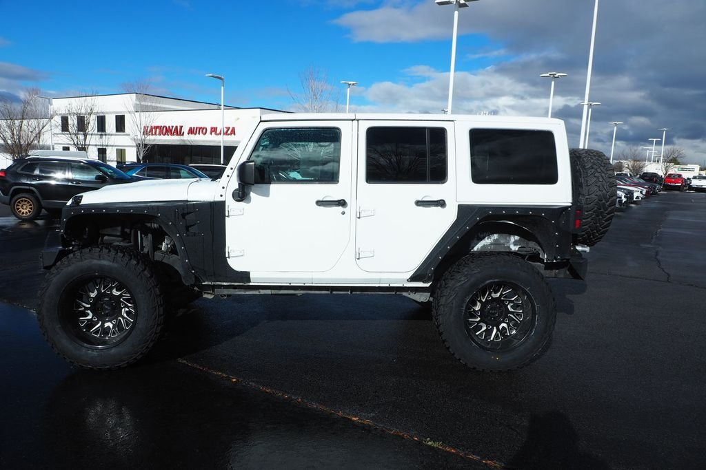 Used 2017 White Jeep Unlimited Sahara image 8