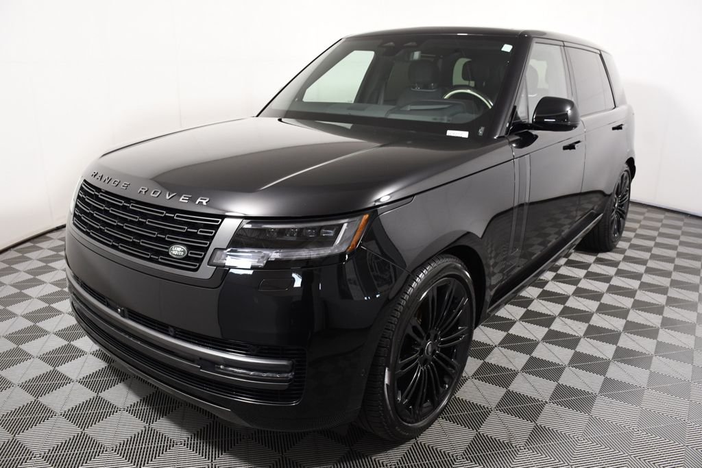 Used 2024 Santorini Black Metallic Land Rover SE image 1
