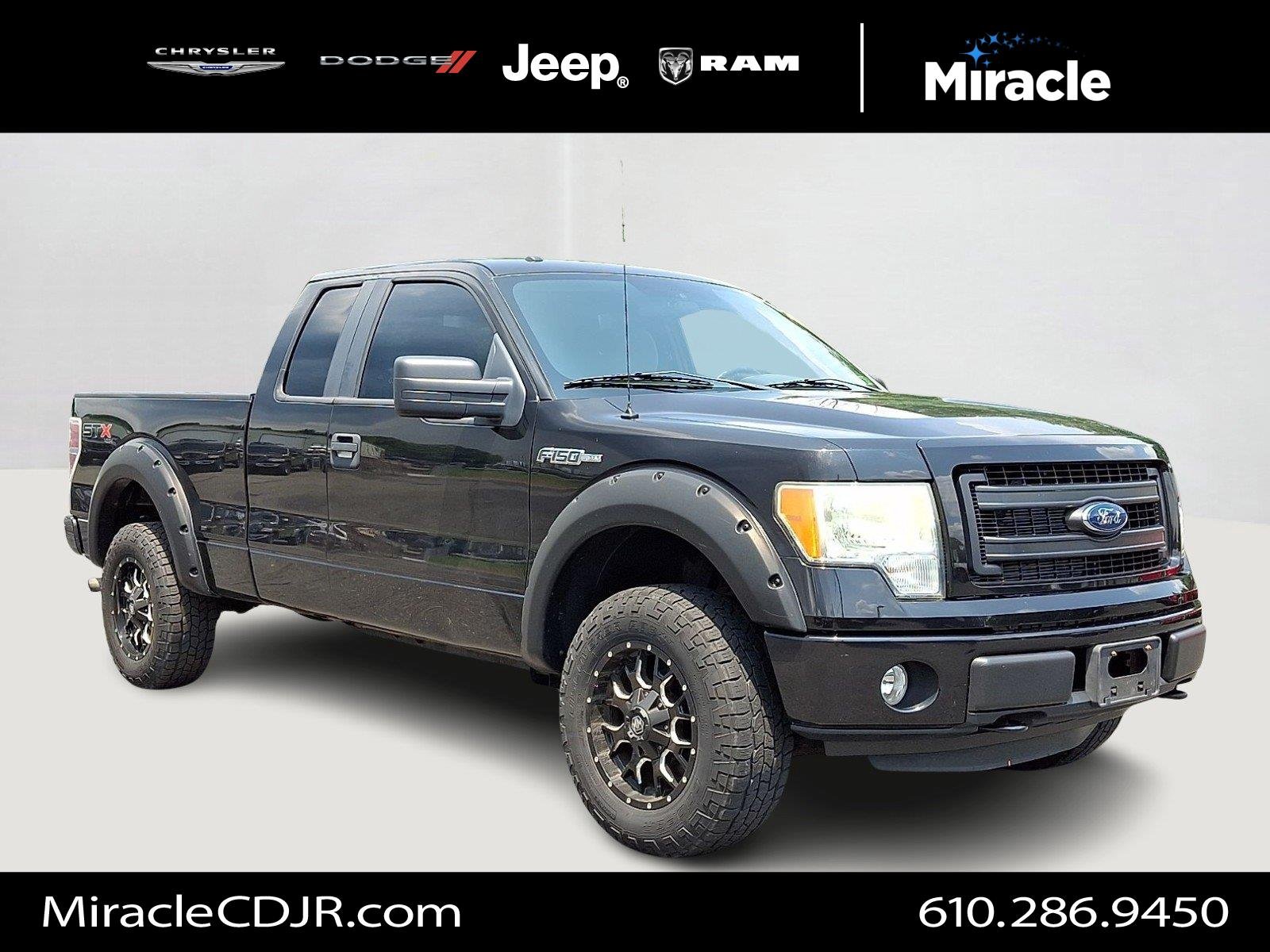 Used 2013 Tuxedo Black Metallic Ford STX image 1