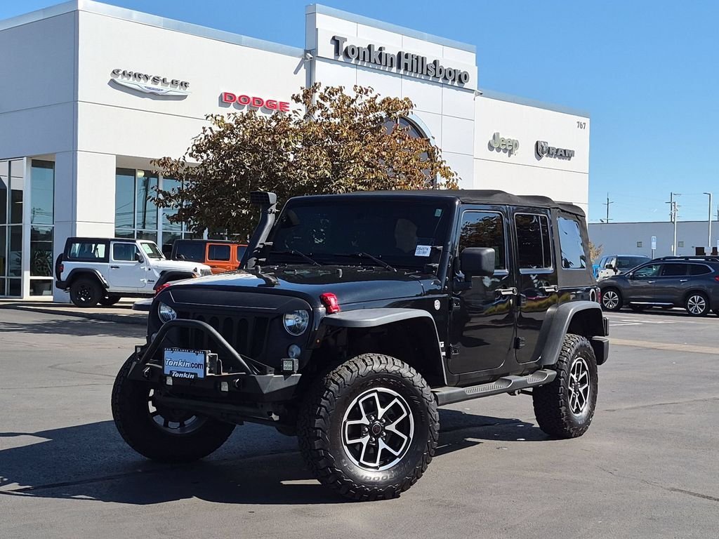 Used 2015 Black Clearcoat Jeep Unlimited Sport image 2