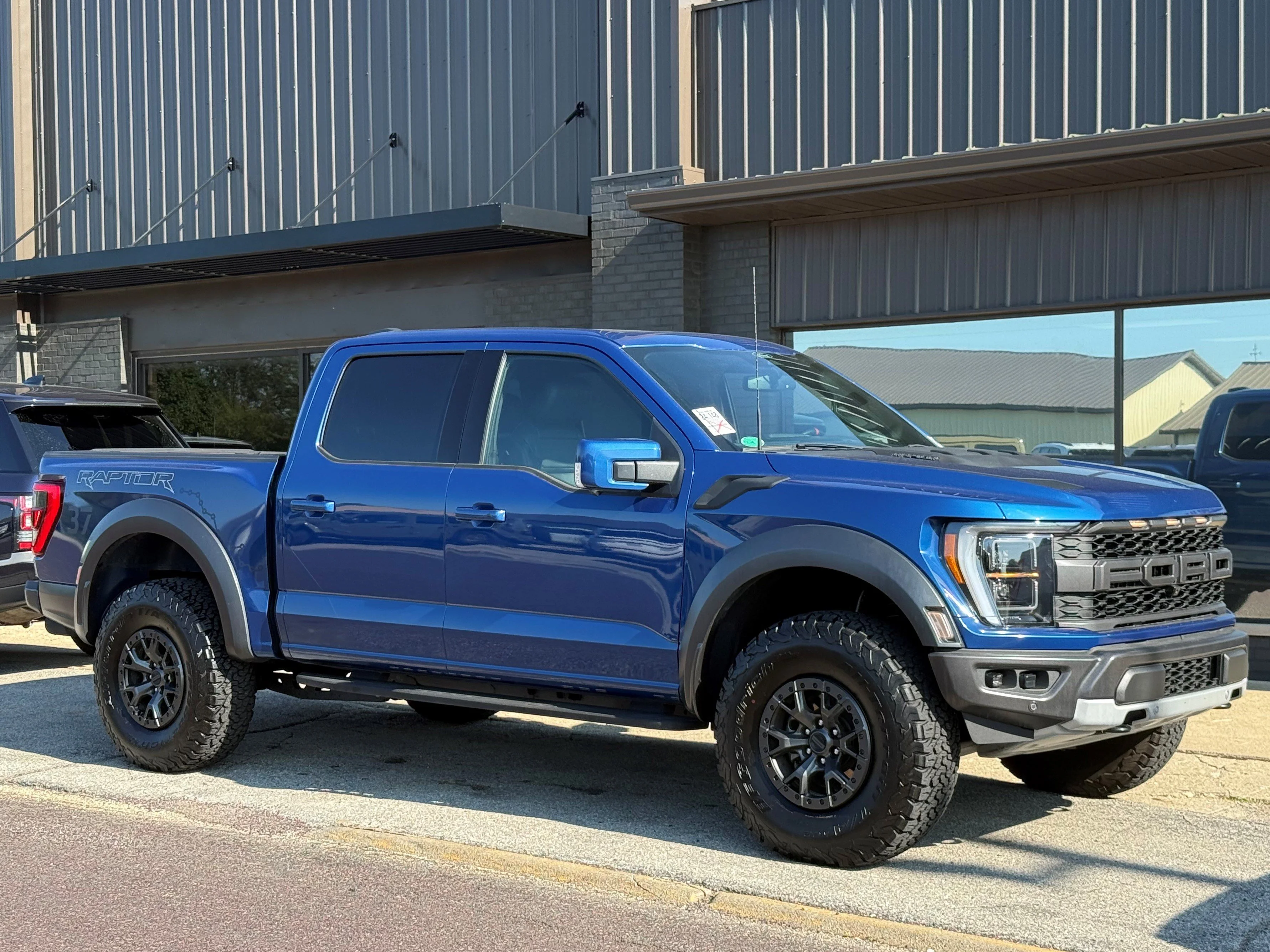 Used 2022 Blue Metallic Ford Raptor image 3