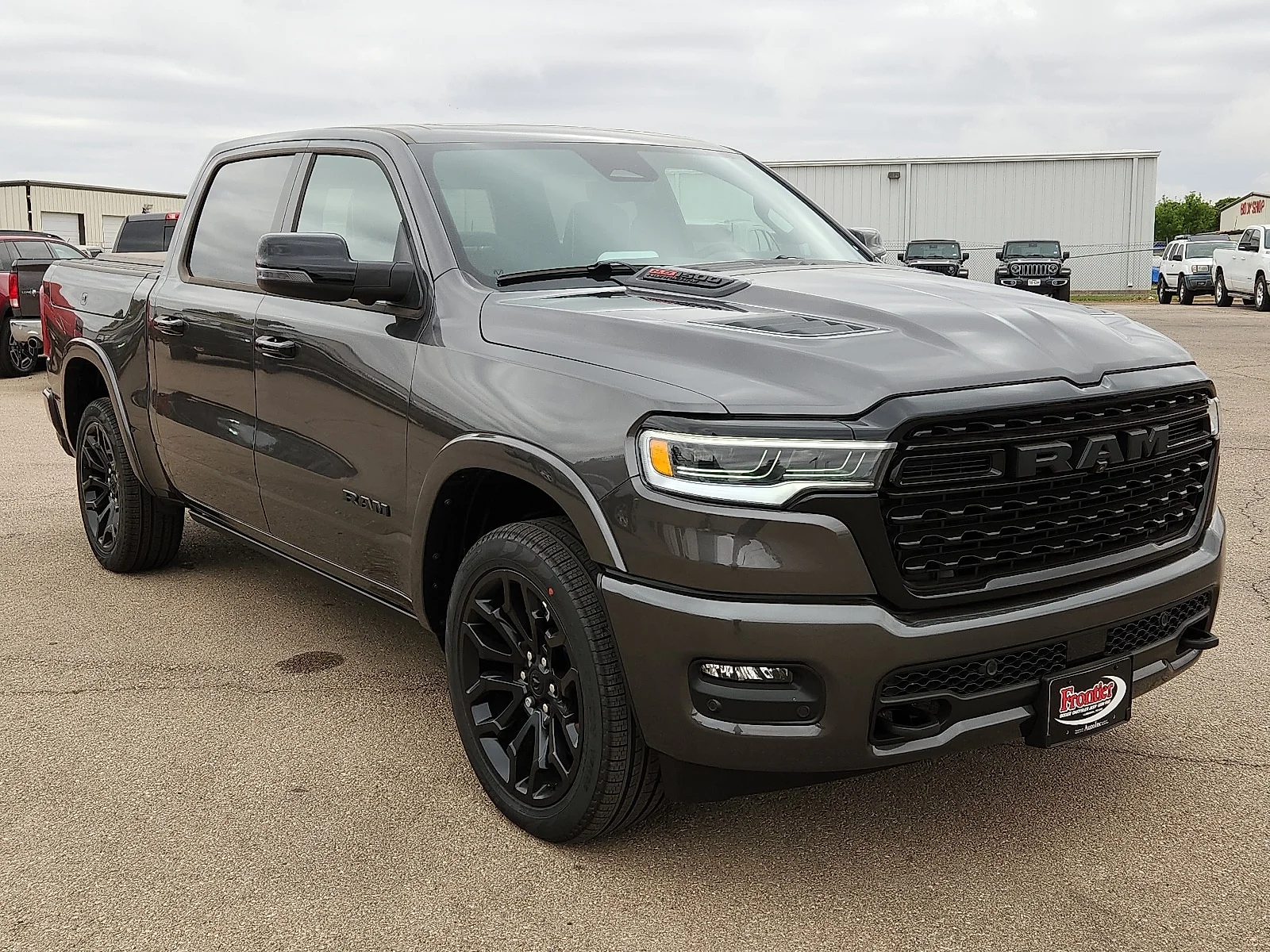New 2026 Granite Crystal Metallic Clearcoat Ram LIMITED CREW CAB 4X4 5