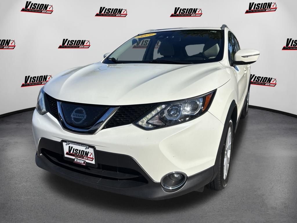Used 2019 White Nissan SV image 1