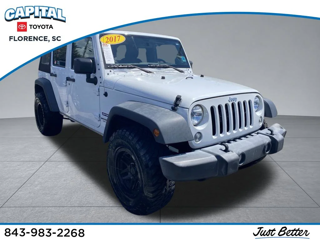Used 2017 White Jeep Unlimited Sport image 1