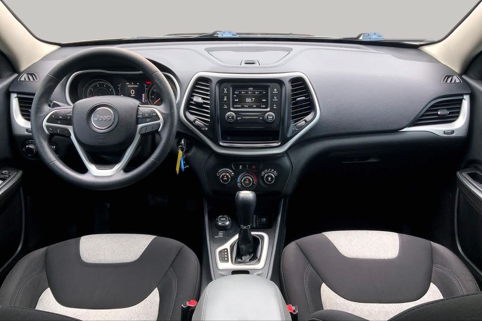 Used 2014 Brilliant Black Crystal Pearlcoat Jeep Sport image 14