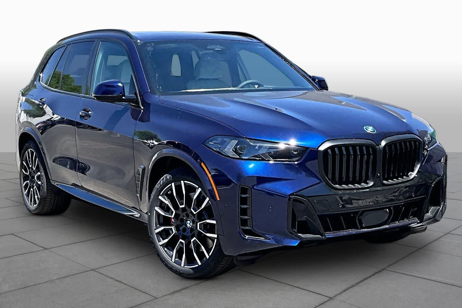 New 2026 Tanzanite Blue II Metallic BMW xDrive50e image 2