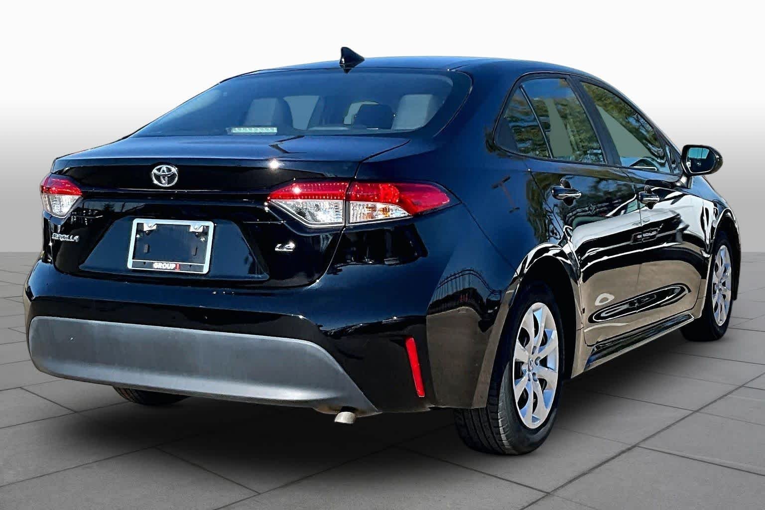 Used 2025 Midnight Black Metallic Toyota LE image 13